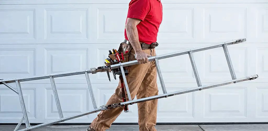 Garage door repair technician arriving with tools and ladder in Tacoma, WA